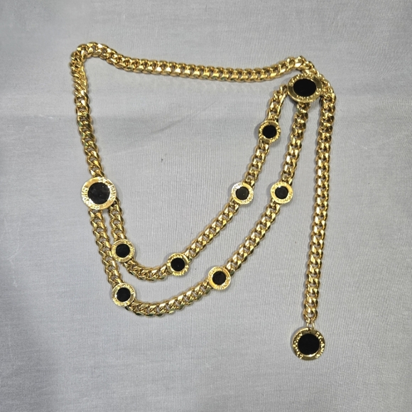 St. John Accessories - VTG 80's St. John Draped Gold Tone Curb Chain Black Enamel Charm Logo Waist Belt
